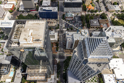 High angle view of street amidst buildings in city
