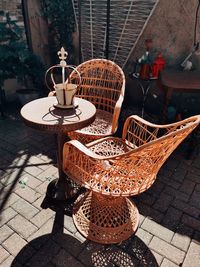 High angle view of wicker basket on table at sidewalk cafe