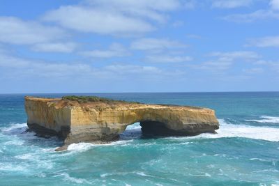 Scenic view of sea against blue sky