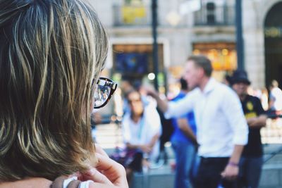 Rear view of woman wearing sunglasses