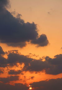 Low angle view of cloudy sky during sunset