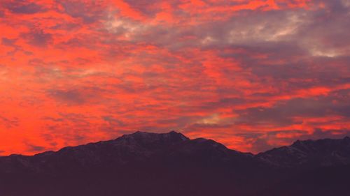 Scenic view of mountains at sunset