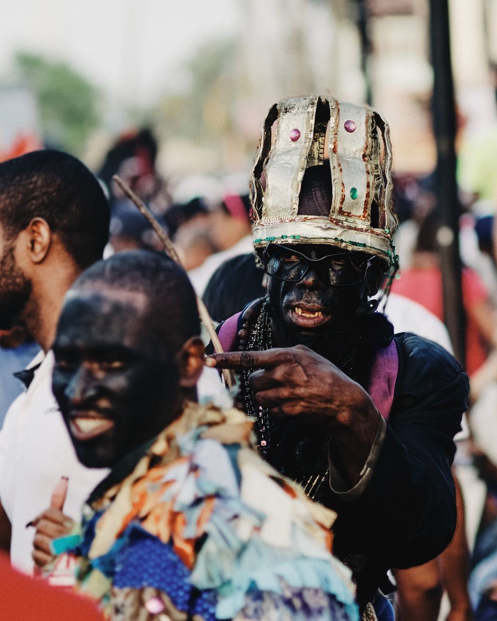real people, men, lifestyles, people, celebration, leisure activity, incidental people, focus on foreground, portrait, arts culture and entertainment, day, clothing, outdoors, group of people, headshot, costume, disguise, festival, carnival - celebration event