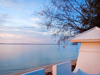 Scenic view of sea against sky at sunset