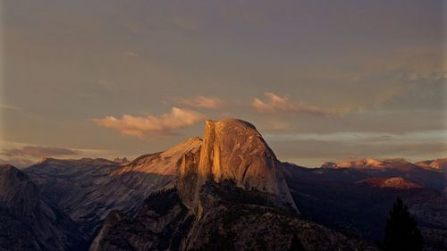 Scenic view of mountains against sky during sunset