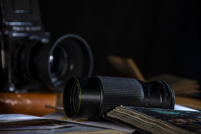 Close-up of camera on table