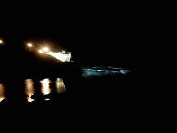 Close-up of illuminated water at night