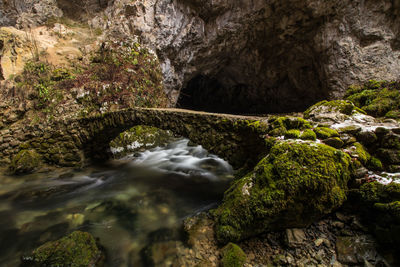 Stream flowing through rocks