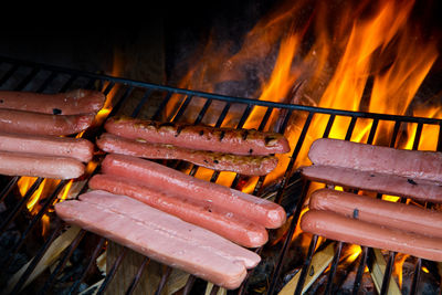 High angle view of meat on barbecue grill