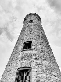 This picture depicts a lighthouse in b/w form