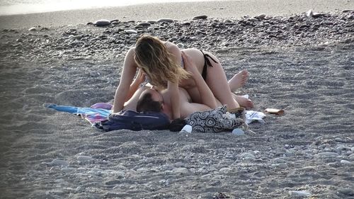 Young woman in bikini on beach