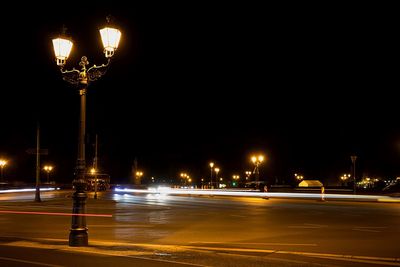 Illuminated street light at night