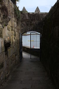 Narrow alley along buildings