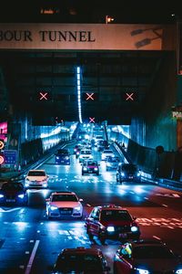 Traffic on road in city at night