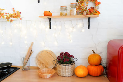 Autumn kitchen with decorations and pumpkins, thanksgiving day 