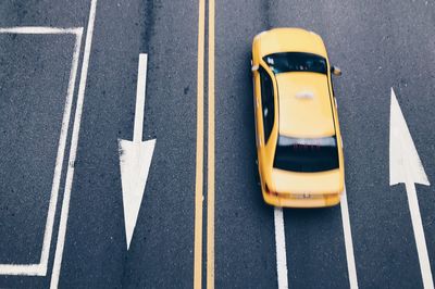 High angle view of yellow taxi on road