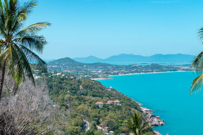 Scenic view of sea against clear blue sky