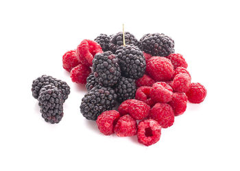 Close-up of raspberries against white background