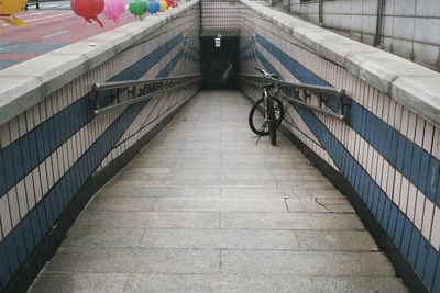 High angle view of bicycle on footpath