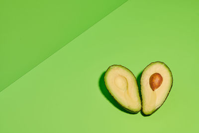 Close-up of fruit against white background