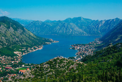 High angle view of townscape by sea