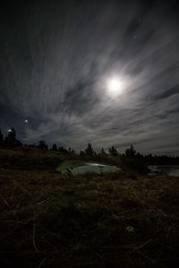 Scenic view of landscape against sky at night