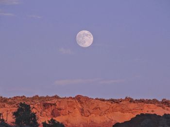 Scenic view of landscape against sky at night