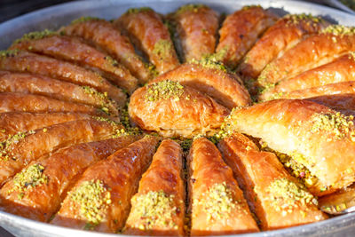 Traditional turkish desserts baklava and lokum in open buffet restaurant at hotel 