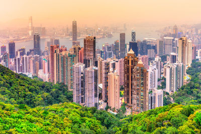 Panoramic view of cityscape against sky during sunset