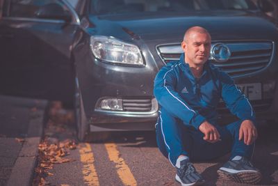 Man sitting in car