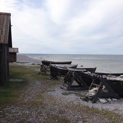 Scenic view of sea against cloudy sky