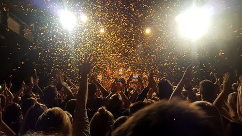 Crowd at music concert at night