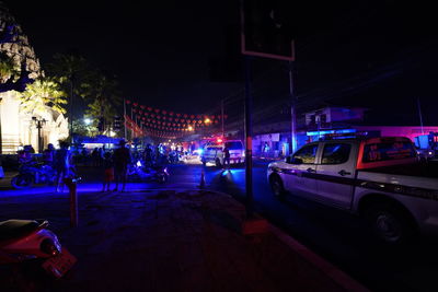 Cars on road at night