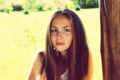 Portrait of beautiful young woman outdoors