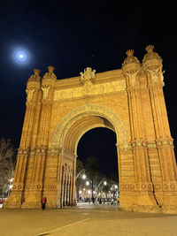 Low angle view of historical building at night