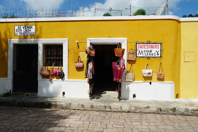 Rear view of people on street in city