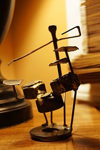 Close-up of guitar on wood
