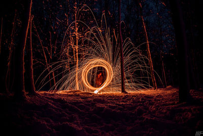 Light painting on field at night