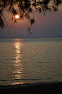Scenic view of sea against sky at sunset