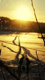 Scenic view of sunset over river