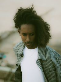 Portrait of young man looking away