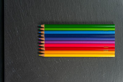 High angle view of multi colored pencils