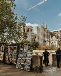 Rear view of woman walking on street