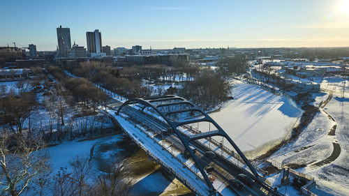 High angle view of city at sunset