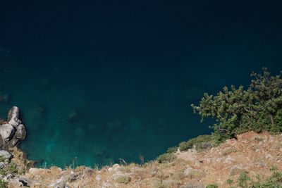 Scenic view of sea against clear blue sky