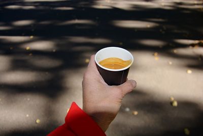 Man holding coffee cup