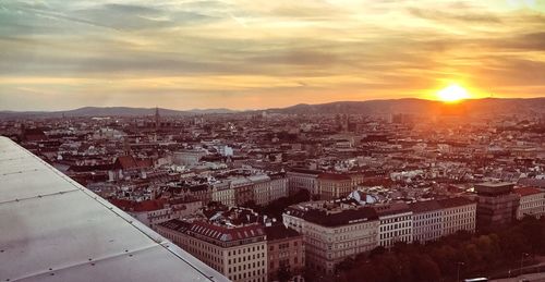 High angle view of city at sunset
