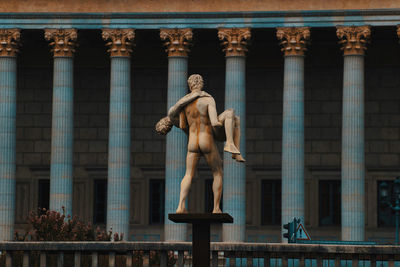 Low angle view of statue against building