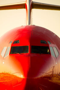 Close-up of airplane on airport runway