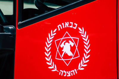 Close-up of text on red car